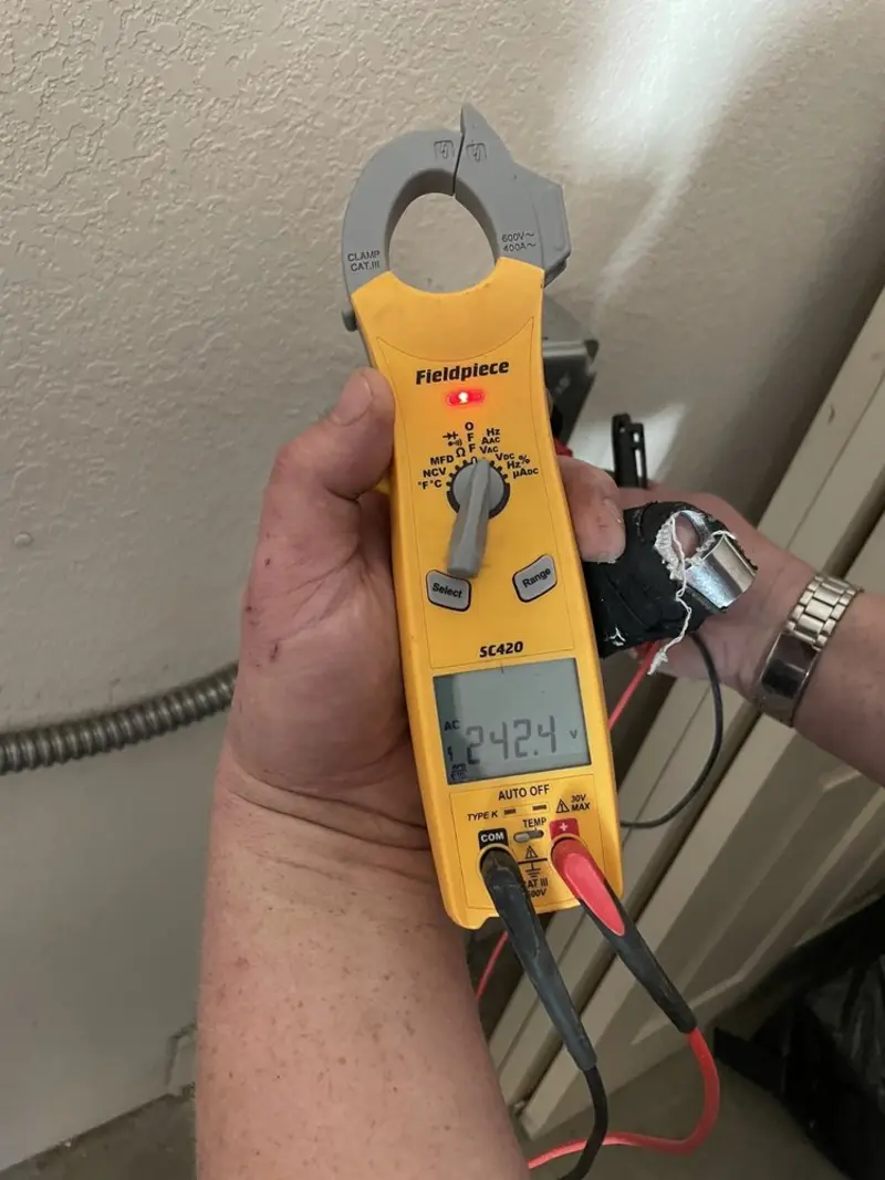 Voltage testing with clamp meter during Generator Installation in St. John